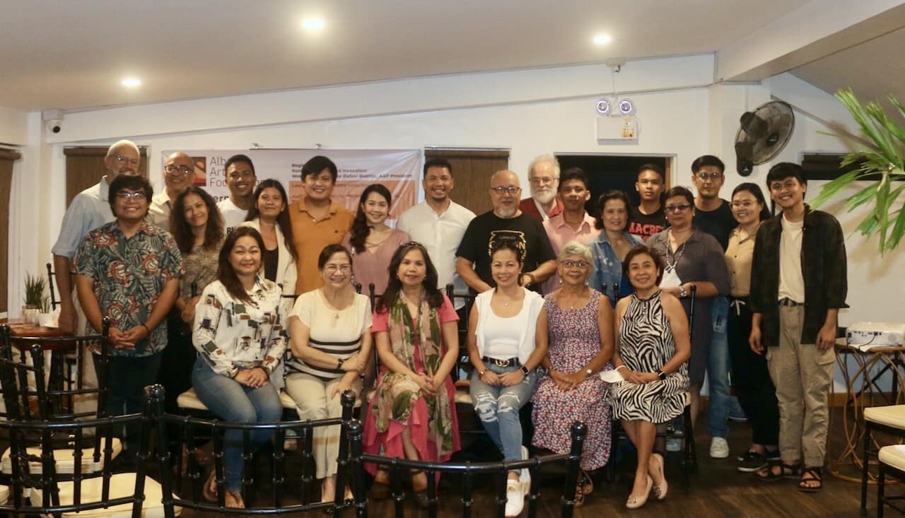 Members of AAF and the Albay community pose with poet and immigrant rights advocate Cynthia T. Buiza after the launching of her debut poetry collection.